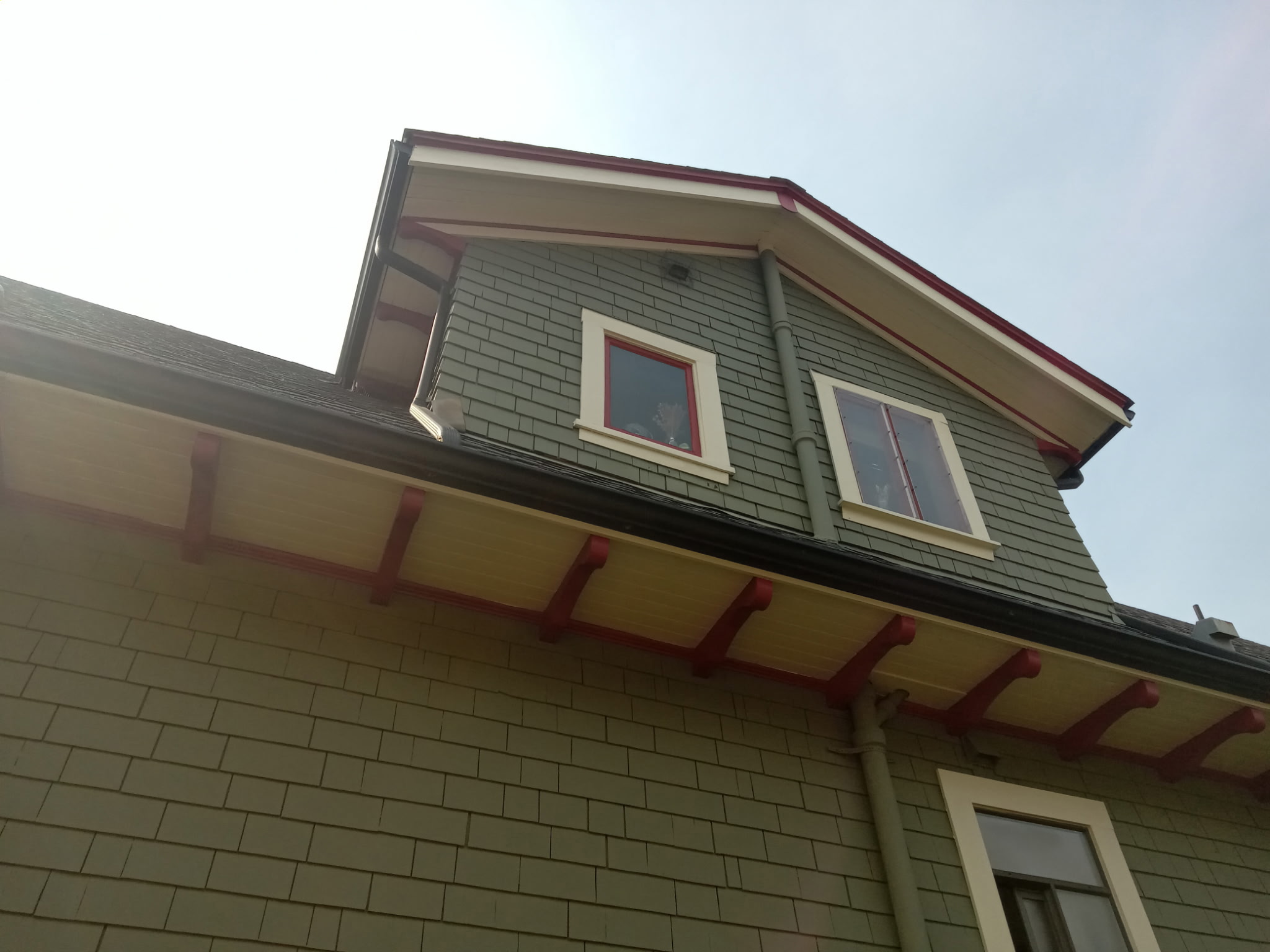 Freshly painted upper exterior with crisp trim and soffits